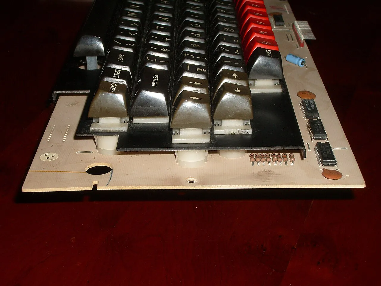 Type 1 Acorn BBC Microcomputer keyboard showing plate-mount switches; in the BBC Micro, it is the PCB that is secured to the case, and not the steel plate